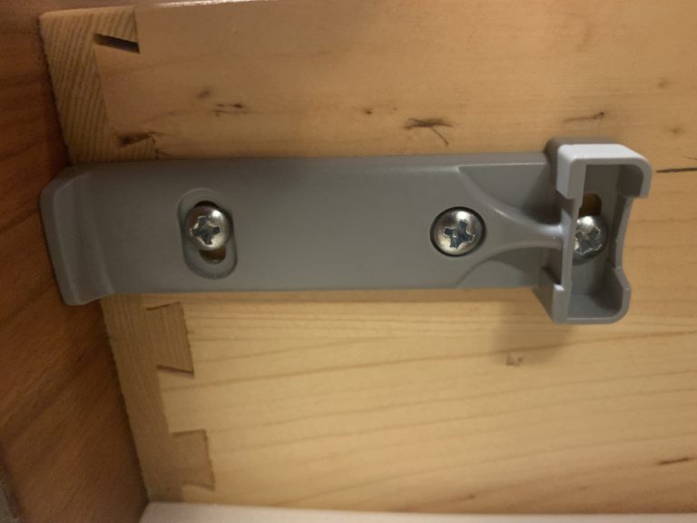 attach soft close drawer adapter to side of drawer