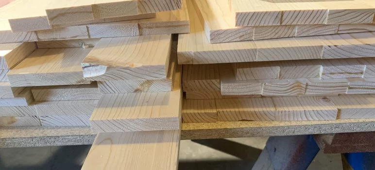 Drum-Sander-Pile-of-Boards-ph Using a Drum Sander on Drawer Side Panels