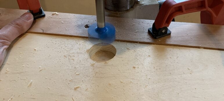 Drilling concealed hinge with a drill press