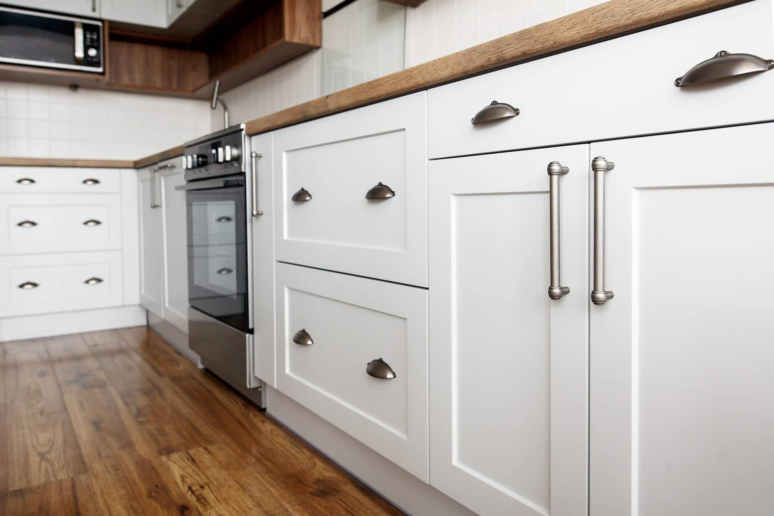 Cabinet Knob Placement The Easy Way To Install Knobs 2023   Farmhouse Kitchen Hardware Large Pulls White Cabinet 1536x1024 