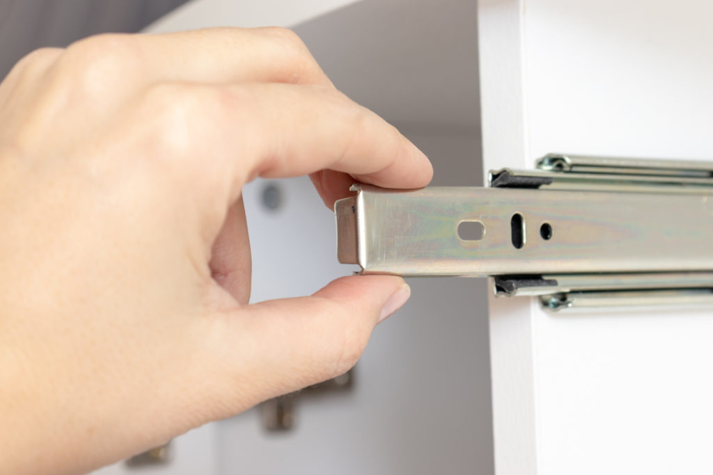 Measure drawer slides for frameless overlay cabinets